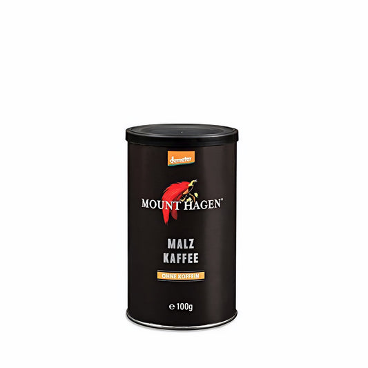 Mount Hagen Malzkaffee Demeter in schwarzer Dose mit rotem Vogelmotiv, von vorne fotografiert, Produktname und Hinweise auf koffeinfrei gut lesbar.