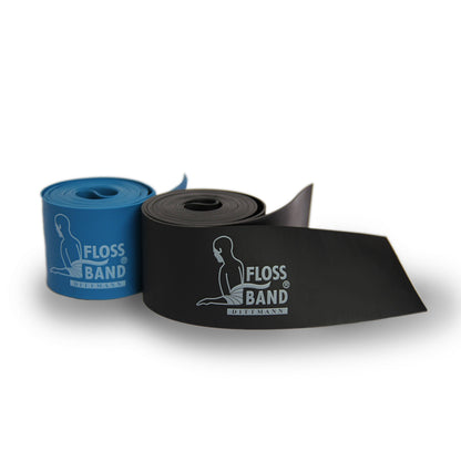Blaue oder schwarze Dittmann Floss-Band® als Fitness-Zubehör auf weißem Hintergrund sichtbar.