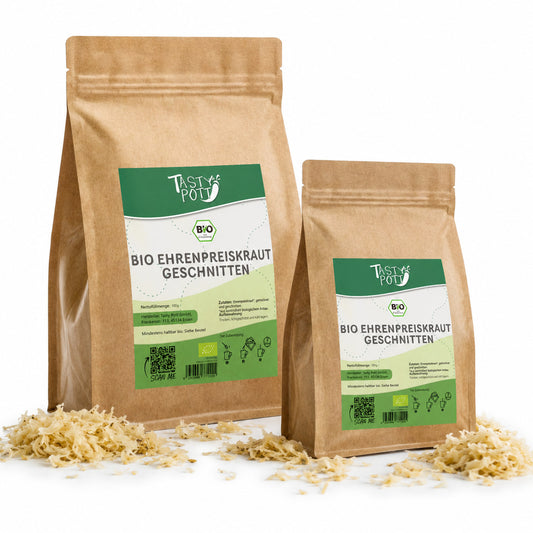 Zwei Beutel Tasty Pott Bio Ehrenpreiskraut geschnitten mit getrocknetem Kräuterinhalt, auf weißem Hintergrund, daneben lose Kräuterstreifen.