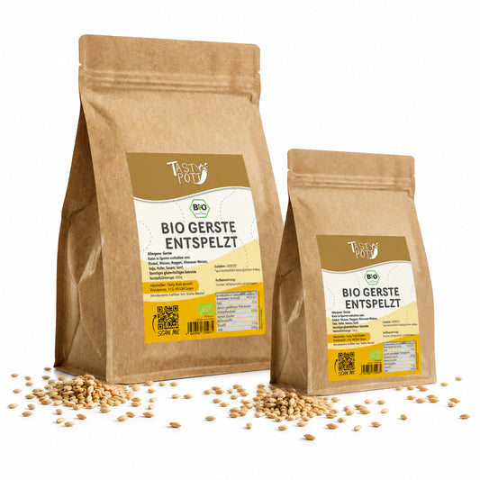 Zwei Beutel Tasty Pott Bio Gerste entspelzt mit sichtbaren Gerstenkörnern auf weißem Hintergrund.