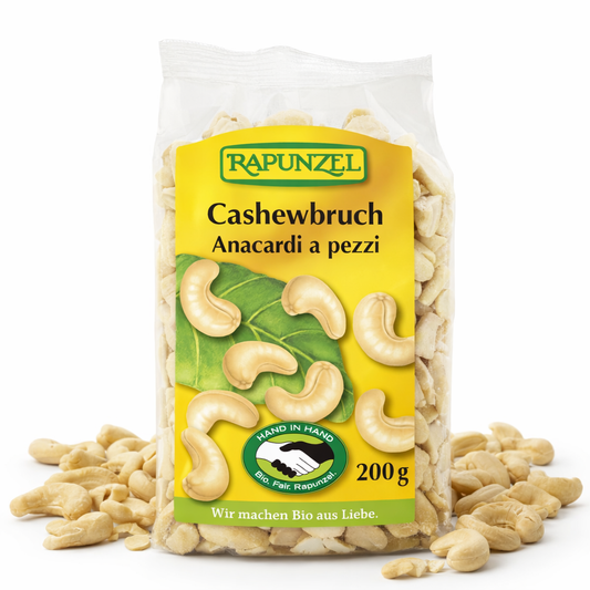 Bio Cashewbruch von Rapunzel, 200g, zum Kochen, zeigt frische, ungesalzene Cashewkerne in einer offenen Packung.