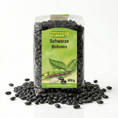 Schwarze Bio-Bohnen von Rapunzel in 500g-Packung, ideal zum Kochen, mit nährstoffreichen, dunklen Bohnen in der Packung.