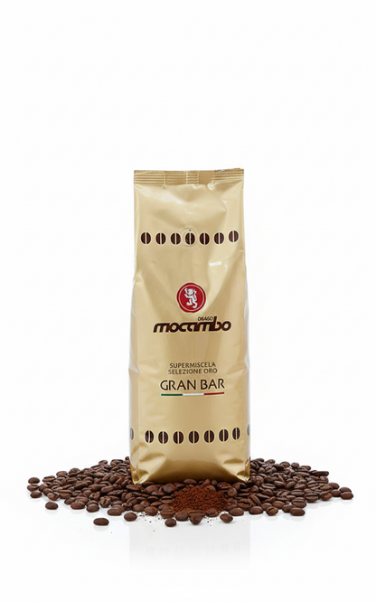 Mocambo Gran Bar Frühstücksriegel von Macambo, 1 kg, mit Nüssen und Hafer in einer offenen Verpackung sichtbar.