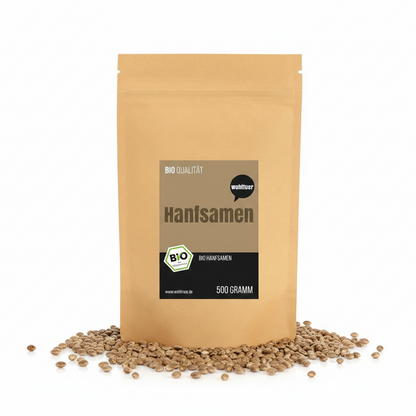Ungeschälte Bio Hanfsamen von Wohltuer, Superfood, 1000g, in einer transparenten Schüssel auf weißem Hintergrund.