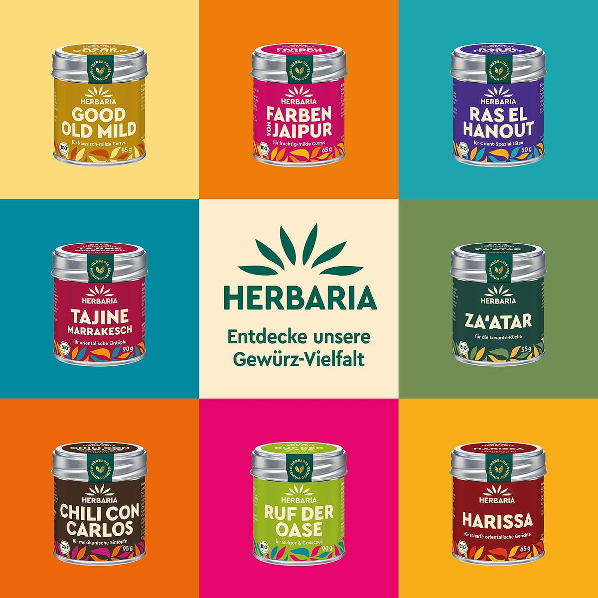 Verschiedene Herbaria Gewürzmischungen in bunten Dosen, darunter Große Karawane, Tajine Marrakesch, Za'atar und weitere Sorten.