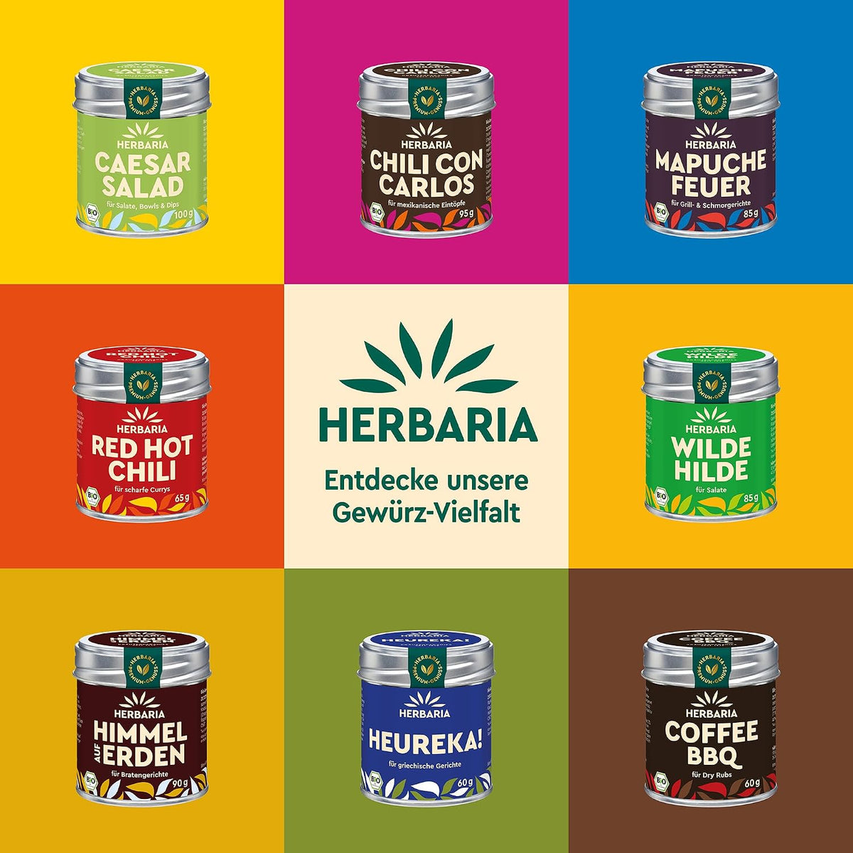 Verschiedene Herbaria Gewürzdosen, darunter Tango Spice, auf buntem Hintergrund als Übersicht der Produktvielfalt.